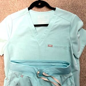 Figs scrub uniform baby blue size top Small 
bottom small petite
Joggers